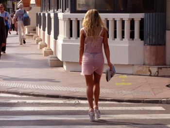 Candid girl with see-through dress and underwear exposing her see through ass