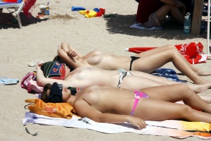 Serial tits on a beach