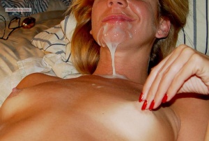 Cum dripping from her chin after delivering a blowjob