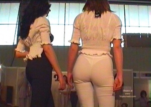 Great rear view of a girl wearing transparent clothing