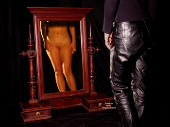 Helen wearing leather pants, but the mirror showing what every male sees