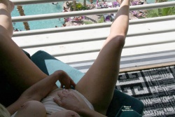 Another lady masturbation on a hotel balcony