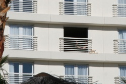 The same lady seen from the pool area of the hotel