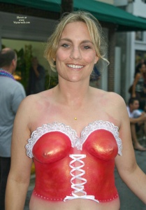 Still topless after bodypainting her tits