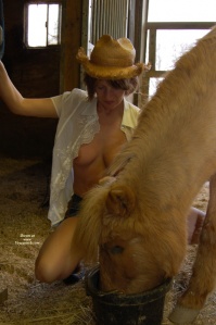 A sexy groom with her lucky horse...