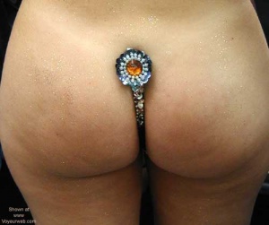 A Brazilian ass with a crowning C-string