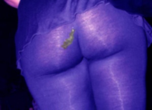 She does not know that the old cum stain is visible in the club under blacklight